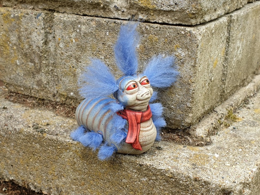 Hand painted 3d printed worm figure from the film Labyrinth